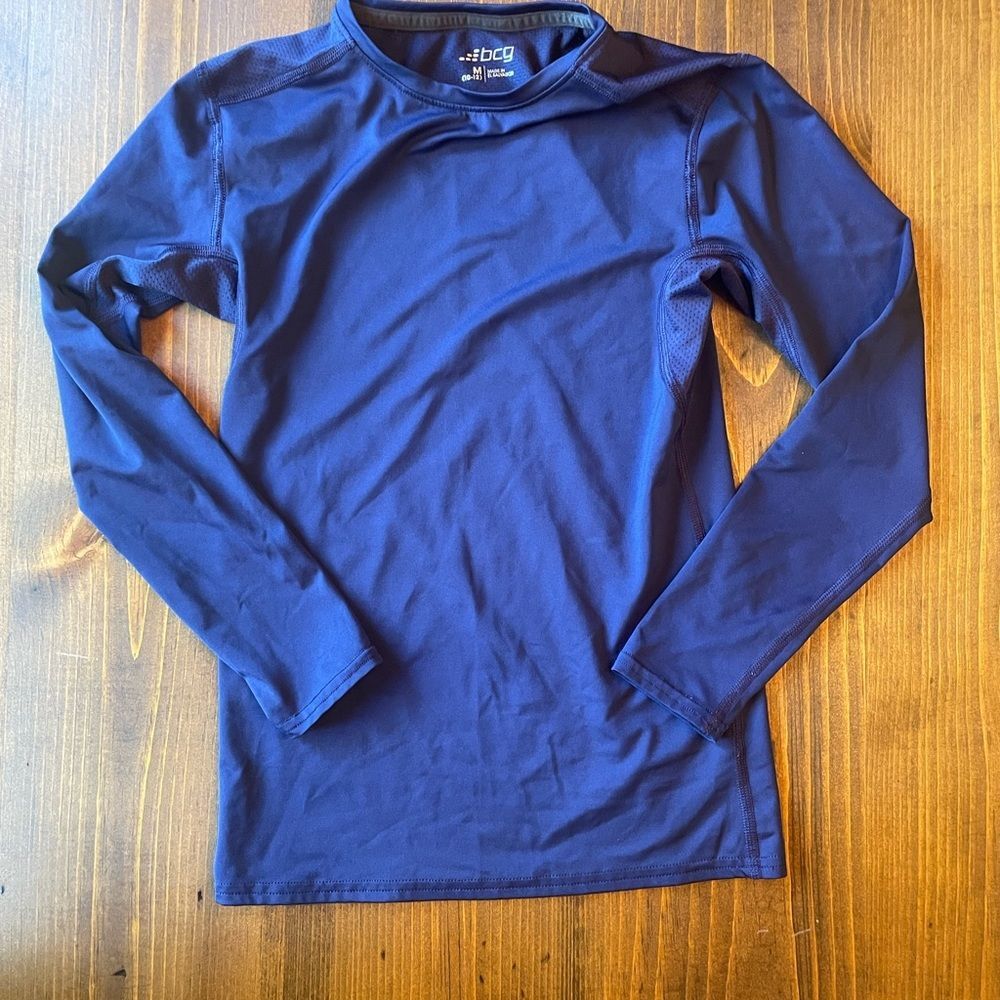 Layering long sleeve tee perfect for sports.